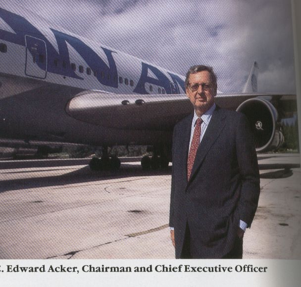 1985, Pan Am Chariman, Ed Acker poses by a 747 in the 'billboard' livery he introduced to Pan Am.